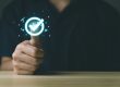 Hand showing digital technology check icon sign