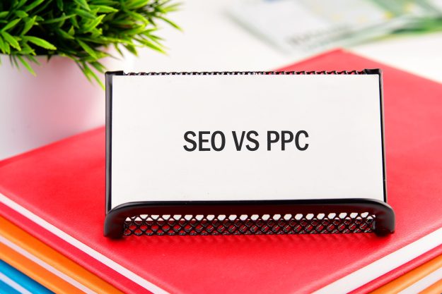 white sign the words SEO versus PPC
